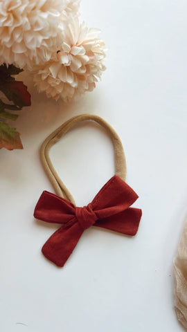 HRT | RUST PINNY ON NYLON HEADBAND
