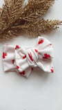 ADD | WHITE WITH RED BOWS